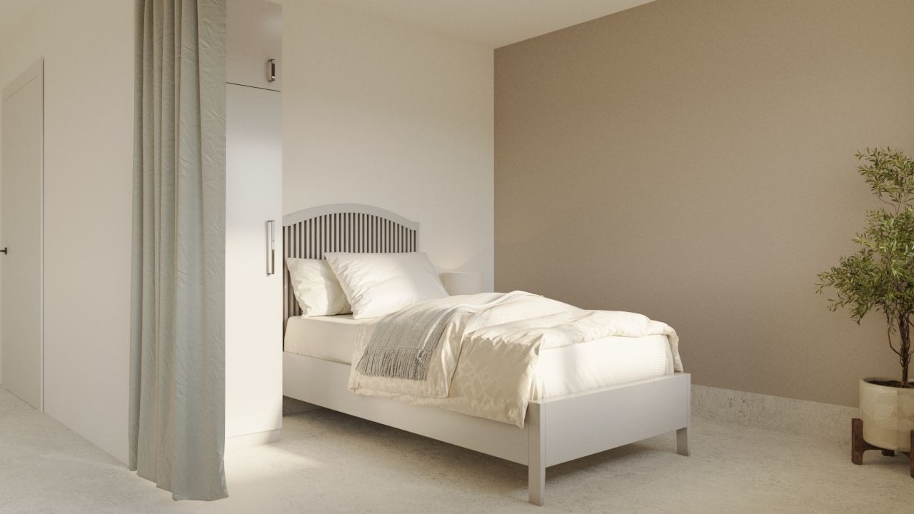 Sovrum i LSS Nocken med säng och ljus inredning anpassad för boende.