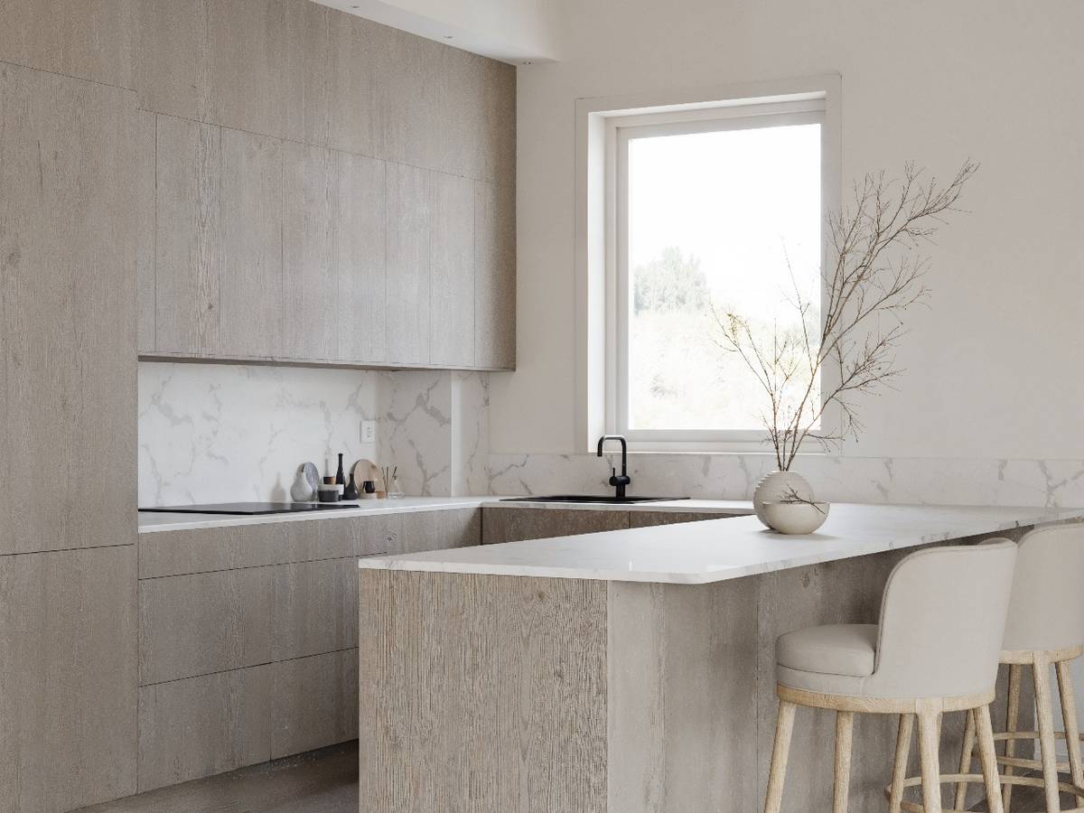 3D-visualisering av ett modernt kök med köksö och skåpsluckor i ljust trä. Bänkskiva och stänkskydd är i vit marmor.